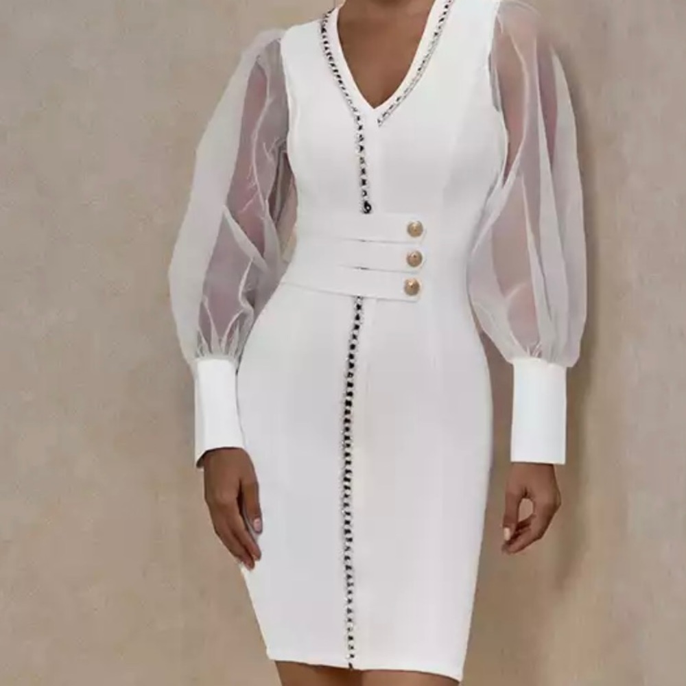 beautiful white dress with gold applications